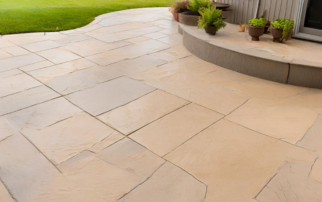 a stamped concrete overlay for a garden patio.