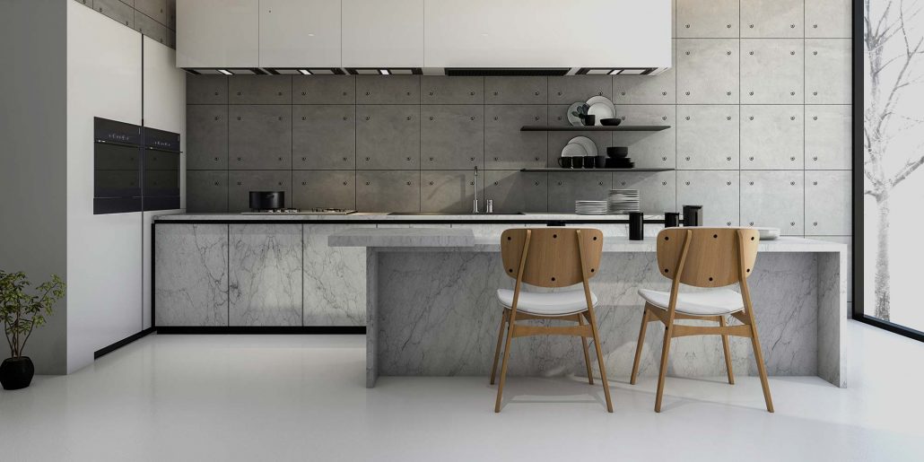 A kitchen which has a concrete overlay as the flooring which has then been polished